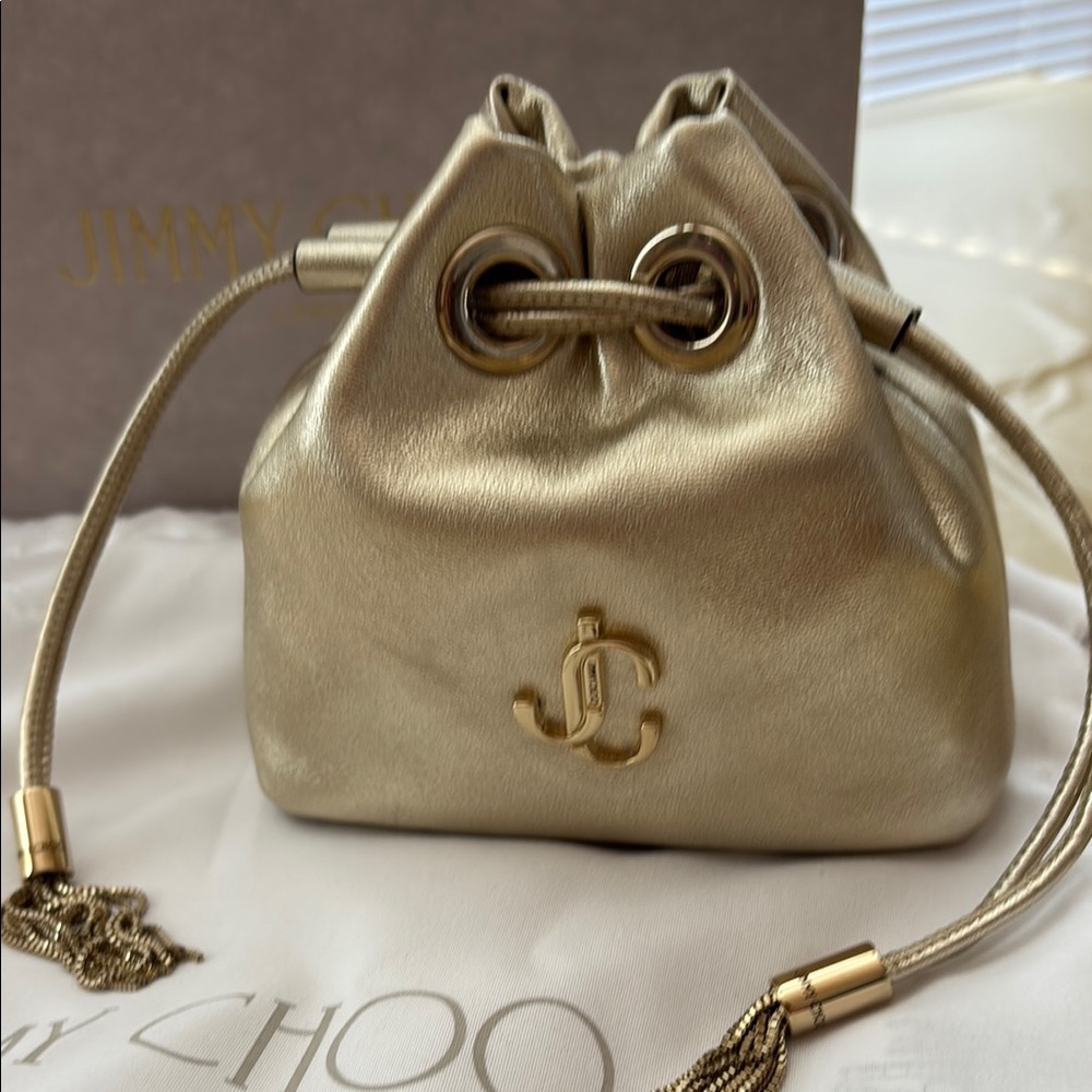 Jimmy Choo Gold Mini BonBon Drawstring Bag with Elegant chain
